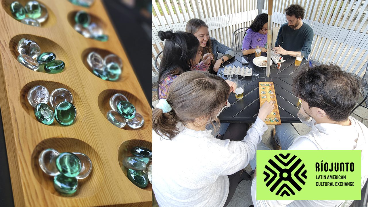 Children playing Mancala during a World of Games workshop